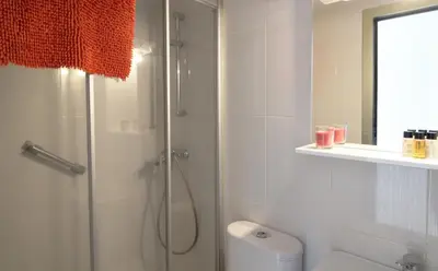 Un baño de Apartamento esquinero en Palamós