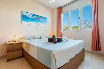 Cama o camas de una habitación en Hauzify I Apartament Balmanya 2A