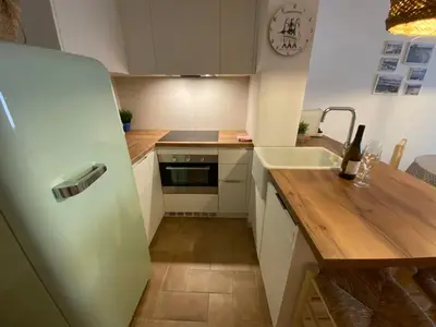 Una cocina o zona de cocina en Apto 1a línea del Paseo Llafranc con Aire acondicionado Sin Vistas