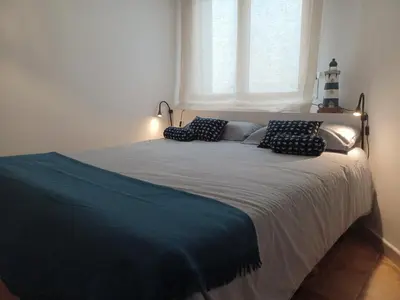 Cama o camas de una habitación en Apto 1a línea del Paseo Llafranc con Aire acondicionado Sin Vistas