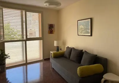 Zona de estar de Luminoso apartamento en Canet de Mar cercano a la playa y a Barcelona