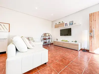 Una televisión o centro de entretenimiento en Apartament 'Es Botànic'