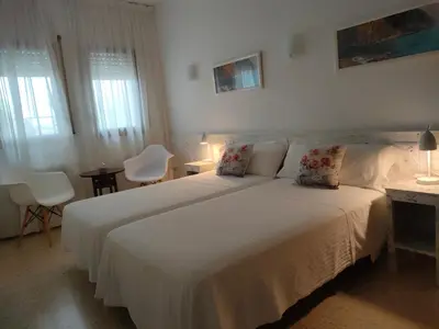 Cama o camas de una habitación en Hostal Los Pinares