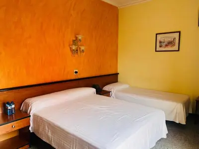 Cama o camas de una habitación en HOTEL CONTINENTAL