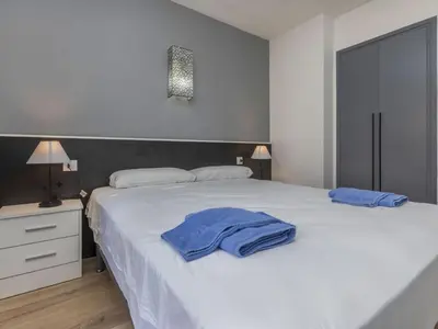 Cama o camas de una habitación en Apartment Cosy Lloret by Interhome