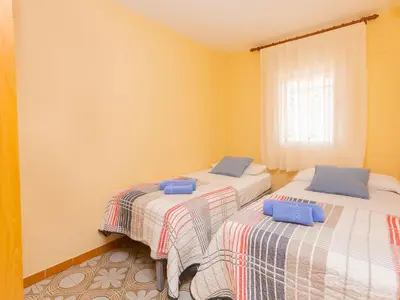 Cama o camas de una habitación en Apartment Nemesis by Interhome