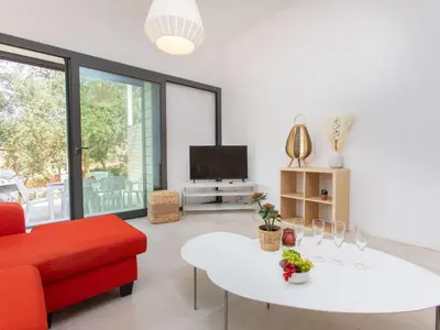 Una televisión o centro de entretenimiento en Holiday Home Brasil by Interhome