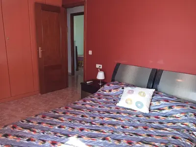 Cama o camas de una habitación en Pis a Blanes amb precioses vistes al mar.
