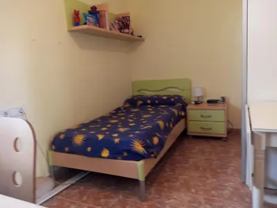 Cama o camas de una habitación en Pis a Blanes amb precioses vistes al mar.