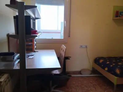 Cama o camas de una habitación en Pis a Blanes amb precioses vistes al mar.