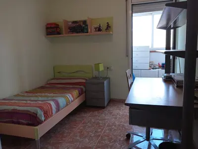 Cama o camas de una habitación en Pis a Blanes amb precioses vistes al mar.