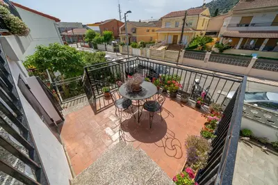 Un balcón o terraza de HomeHolidaysRentals Dona - Costa Barcelona