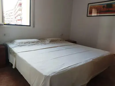 Cama o camas de una habitación en APARTAMENTO A PIE DE LA PLAYA