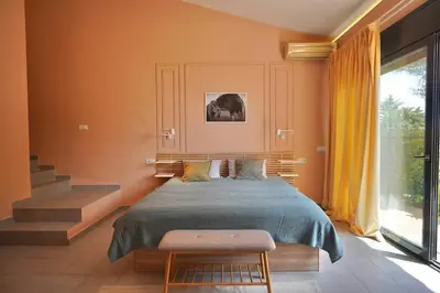 Cama o camas de una habitación en Villa de lujo de 4 dormitorios, piscina y barbacoa