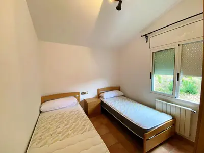 Cama o camas de una habitación en Bright Villa in Vidreres with Private Pool and Jacuzzi