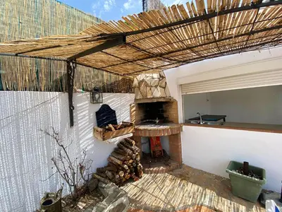 Una televisión o centro de entretenimiento en Bright Villa in Vidreres with Private Pool and Jacuzzi