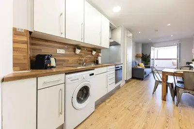 Una cocina o zona de cocina en Bravissimo Eiximenis, with beautiful terrace and views