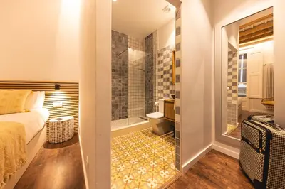 Cama o camas de una habitación en Bravissimo Ferreries, unique 3-bedroom apartment