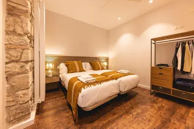 Cama o camas de una habitación en Bravissimo Ferreries, unique 3-bedroom apartment