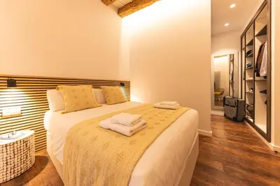 Cama o camas de una habitación en Bravissimo Ferreries, unique 3-bedroom apartment