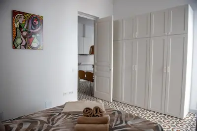 Cama o camas de una habitación en Hauzify I Apartament Can Missé