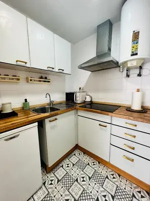 Una cocina o zona de cocina en Encantador apartamento en Tossa de Mar