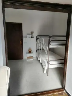 Cama o camas de una habitación en Casa con piscina en Calonge, pueblo medieval entre mar y montaña