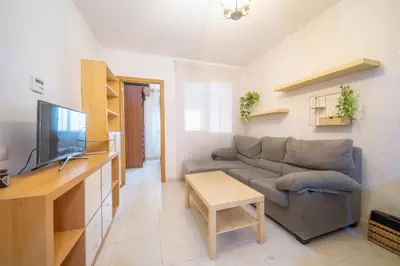 Una televisión o centro de entretenimiento en HomeHolidaysRentals Milos - Costa Barcelona