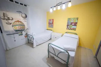 Cama o camas de una habitación en HomeHolidaysRentals Milos - Costa Barcelona