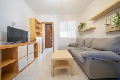 Una televisión o centro de entretenimiento en HomeHolidaysRentals Milos - Costa Barcelona