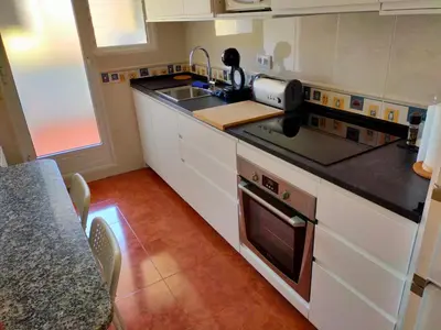 Una cocina o zona de cocina en Apartament Géminis, 5 min playa, parking gratis