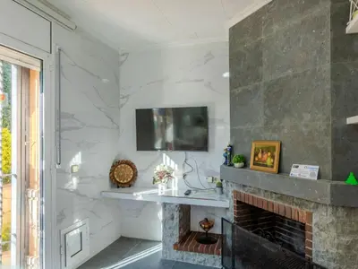 Una televisión o centro de entretenimiento en Holiday Home Aguilera by Interhome