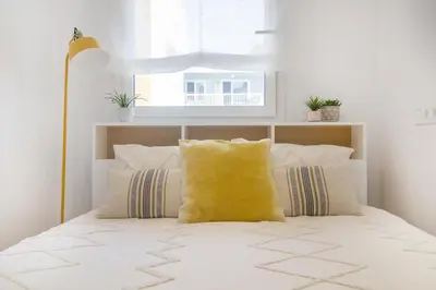 Cama o camas de una habitación en Vivalidays Apartour - Calella