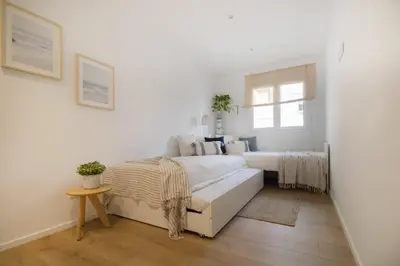Cama o camas de una habitación en Vivalidays Apartour - Calella