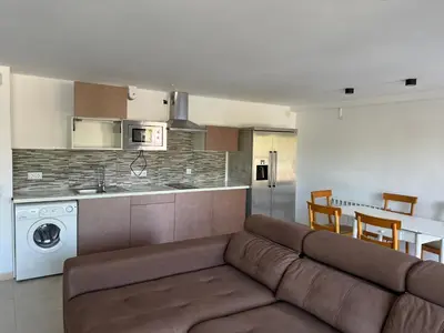 Una cocina o zona de cocina en La casa Linda con terraza y vistas al mar