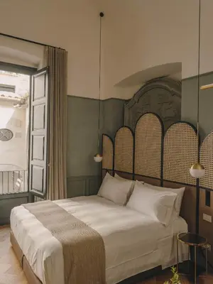 Cama o camas de una habitación en Hotel Palau Fugit