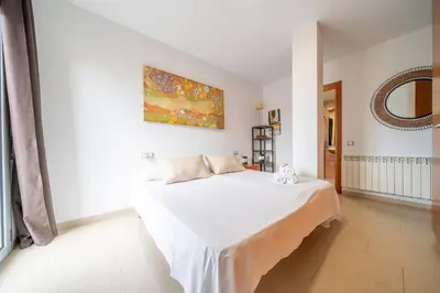 Cama o camas de una habitación en HomeHolidaysRentals Blanescel - Costa Brava