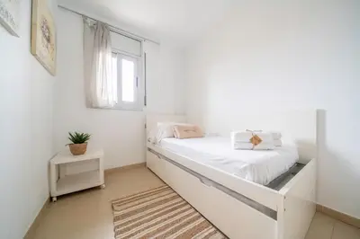 Cama o camas de una habitación en HomeHolidaysRentals Blanescel - Costa Brava