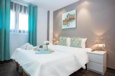 Cama o camas de una habitación en AL36 - Apartamento de lujo a 100 metros de playa