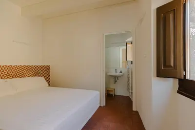 Cama o camas de una habitación en Flateli Santa Clara 01
