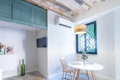 Una televisión o centro de entretenimiento en Argenta Boutique Apartment