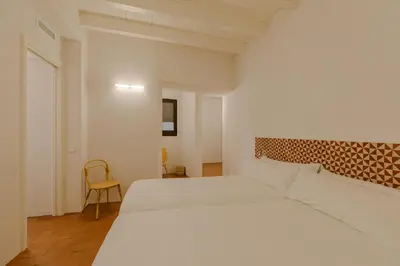 Cama o camas de una habitación en Flateli Santa Clara 02