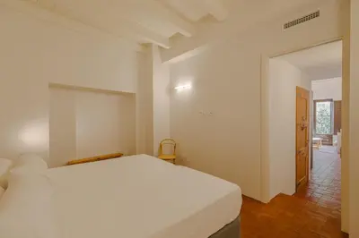 Cama o camas de una habitación en Flateli Santa Clara 02