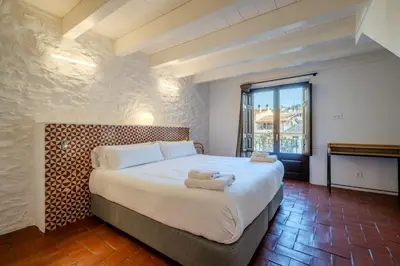 Cama o camas de una habitación en Flateli Santa Clara 22