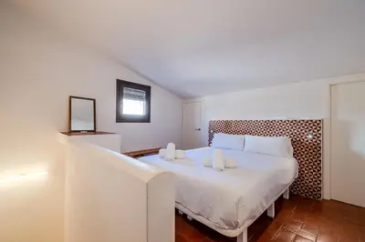 Cama o camas de una habitación en Flateli Santa Clara 31
