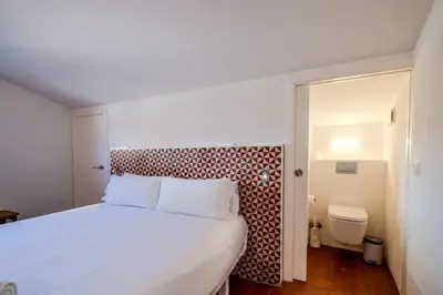 Cama o camas de una habitación en Flateli Santa Clara 31