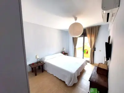 Cama o camas de una habitación en BRAVAHOLIDAYS-201-Pineda