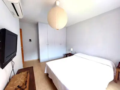 Una televisión o centro de entretenimiento en BRAVAHOLIDAYS-201-Pineda