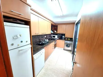 Una cocina o zona de cocina en BRAVAHOLIDAYS-201-Pineda
