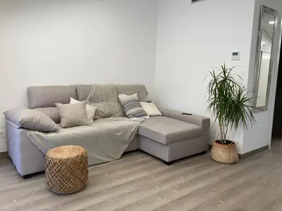 Zona de estar de Apartamento céntrico con WIFI y climatizado de 1 habitación y sofá-cama para 3 personas